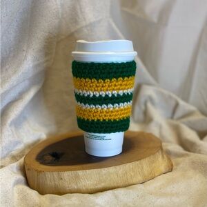 Crochet coffee cozy green, gold, and white for small to medium coffee